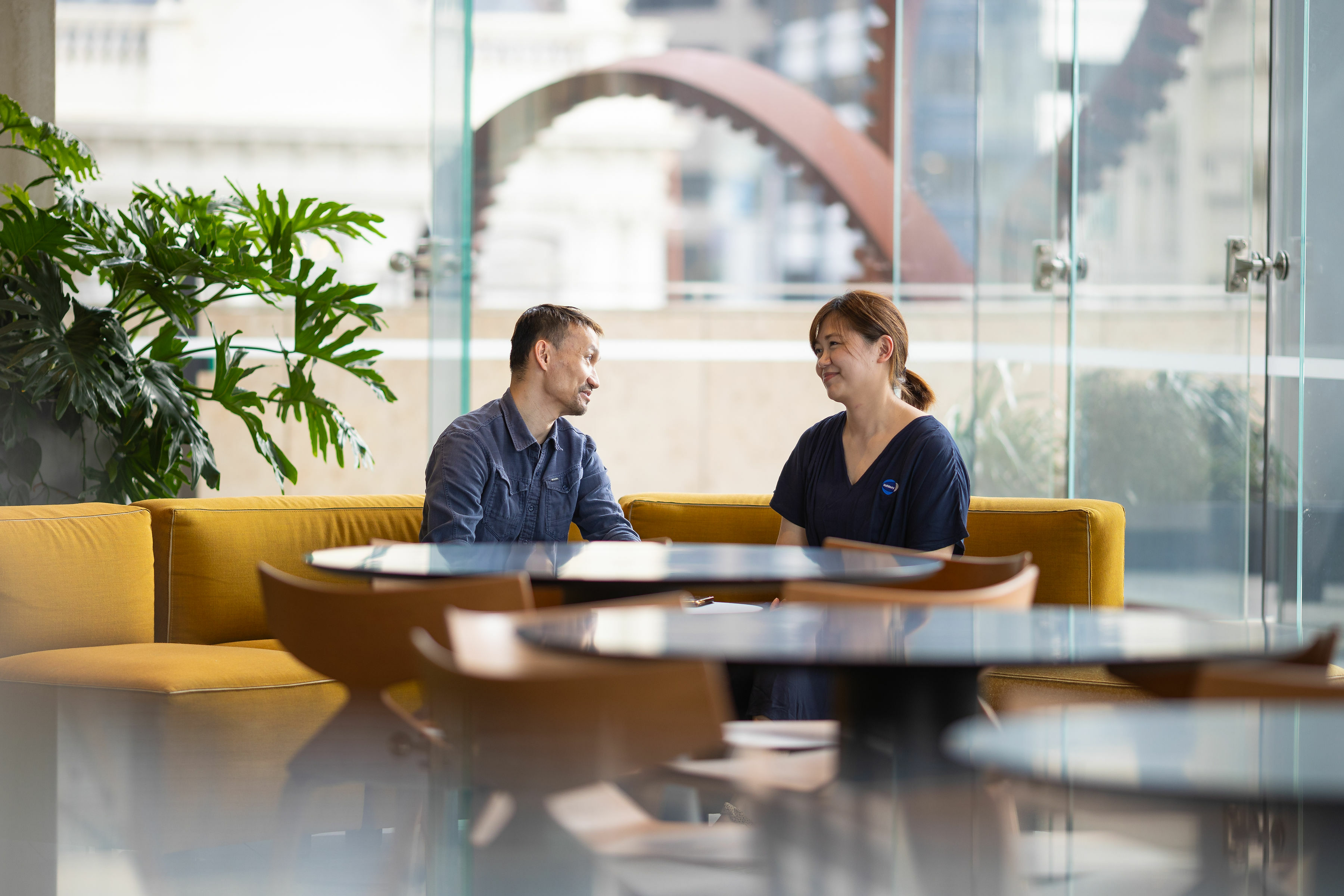 Two people meeting about Rothbury Insurance.